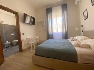 Postel nebo postele na pokoji v ubytování B&B 10 mt dal duomo