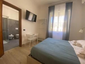 Postel nebo postele na pokoji v ubytování B&B 10 mt dal duomo