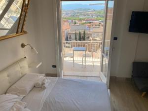 Postel nebo postele na pokoji v ubytování B&B 10 mt dal duomo