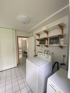 Kuchyň nebo kuchyňský kout v ubytování Guesthouse Hraunbaer