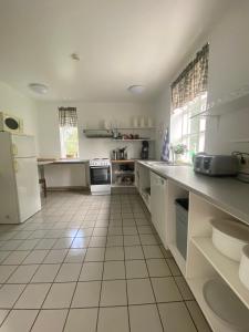 Kuchyň nebo kuchyňský kout v ubytování Guesthouse Hraunbaer