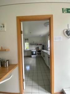 Kuchyň nebo kuchyňský kout v ubytování Guesthouse Hraunbaer
