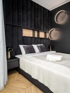 Postel nebo postele na pokoji v ubytování Kasprzaka 29 Panorama Tower 21 Th Floor By Perfect Apart