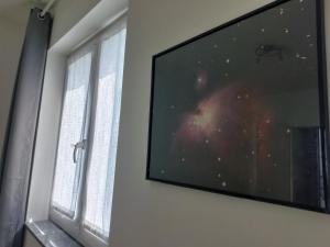 TV a/nebo společenská místnost v ubytování Skylab