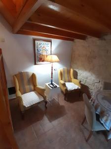 Posezení v ubytování Pensión Antonio Guesthouse