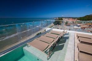a group of chairs on top of a building at JANGA HOTEL BOUTIQUE in Maragogi +7 photos