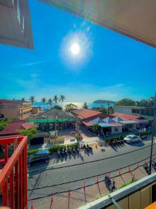 a view from a balcony of a town with a street at Amzar Motel Cenang in Pantai Cenang