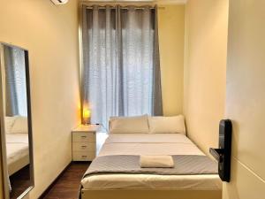 Postel nebo postele na pokoji v ubytování Bergamoincity