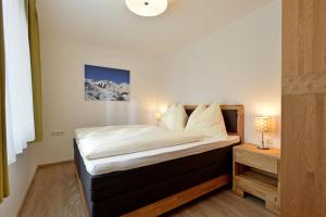 Posteľ alebo postele v izbe v ubytovaní Appartement Ortner
