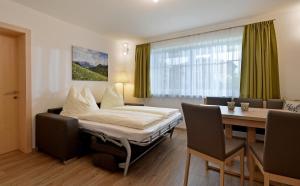 Posteľ alebo postele v izbe v ubytovaní Appartement Ortner