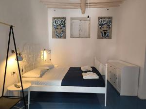 En eller flere senge i et værelse på da Massimo