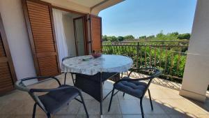 Ein Balkon oder eine Terrasse in der Unterkunft Apartments Villa Tre Marie