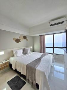 Postel nebo postele na pokoji v ubytování 1313 Flat de Luxo com vista maravilhosa do Rio