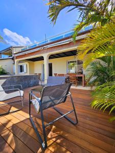 Fotografie z fotogalerie ubytování La Case des Palmistes 4 Etoiles, piscine jacuzzi, billard, et vue océan v destinaci Petite Ile