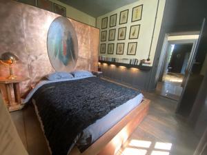 Postel nebo postele na pokoji v ubytování Château de Clemency