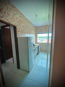 Kuchyň nebo kuchyňský kout v ubytování Sol Hostel & Pousada Maragogi