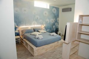Postel nebo postele na pokoji v ubytování Magazzini Sasso Guest House + 37 fotografií