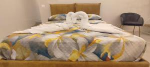 Postel nebo postele na pokoji v ubytování FeVi Home