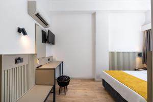 TV a/nebo společenská místnost v ubytování Lemon Hotel