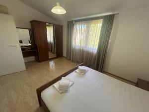 Postel nebo postele na pokoji v ubytování Аpartments Comfort -Marina Cape