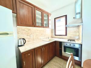 Kuchyň nebo kuchyňský kout v ubytování Аpartments Comfort -Marina Cape