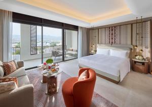 Postel nebo postele na pokoji v ubytování Mandarin Oriental, Muscat