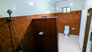 Koupelna v ubytování Mwana House + 29 fotografií