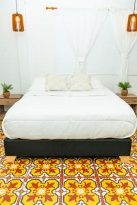 Cama ou camas em um quarto em Puesta del Sol Guest House