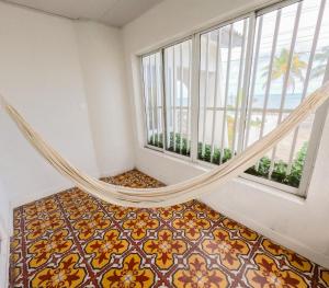 Cama ou camas em um quarto em Puesta del Sol Guest House