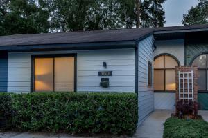 a tiny house with a sign that reads at Quiet, convenient & Modern Haven in Gainesville
