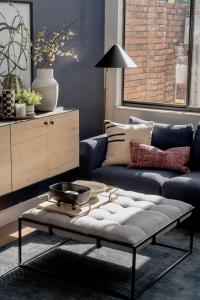 a living room with a couch and a coffee table at Quiet, convenient & Modern Haven in Gainesville