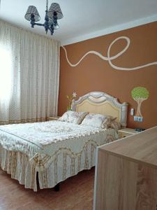 Postel nebo postele na pokoji v ubytování Hospedaje casaAlfredo
