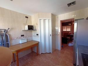 Kuchyň nebo kuchyňský kout v ubytování Hospedaje casaAlfredo
