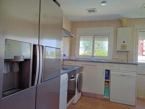 Kuchyň nebo kuchyňský kout v ubytování Hospedaje casaAlfredo