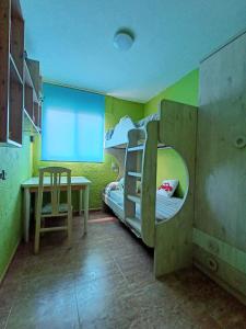 Postel nebo postele na pokoji v ubytování Hospedaje casaAlfredo