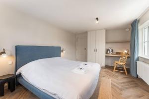Ένα ή περισσότερα κρεβάτια σε δωμάτιο στο Villa Manouchka Stay in all luxury seaside