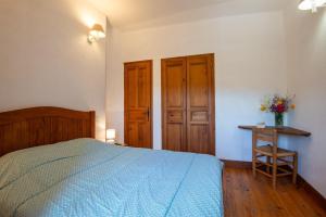 Postel nebo postele na pokoji v ubytování Gîte Gîte 4/6 personnes à Malbosc