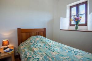Postel nebo postele na pokoji v ubytování Gîte Gîte 4/6 personnes à Malbosc