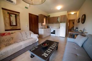 A kitchen or kitchenette at Melograno Apartments and Studios