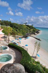 a view of a beach with a swimming pool at Pompano Beach Club in Southampton