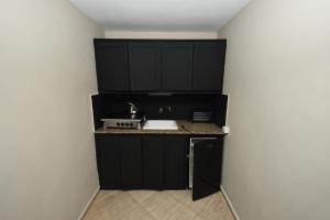 Kuchyň nebo kuchyňský kout v ubytování Agyad Maroc Appart-Hotel