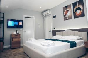Postel nebo postele na pokoji v ubytování Hotel Iseberi