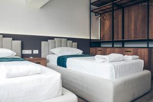 Postel nebo postele na pokoji v ubytování Hotel Iseberi