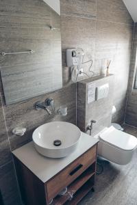 Koupelna v ubytování Hotel Iseberi