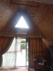 Ruang duduk di The Cottage in Mandarins +3 gambar