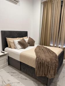 a bedroom with a bed with a blanket on it at Mark Suite B8 in Fuengirola