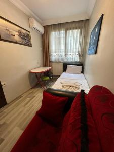 Postel nebo postele na pokoji v ubytování AWWA APART HOTEL
