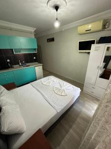 Kuchyň nebo kuchyňský kout v ubytování AWWA APART HOTEL