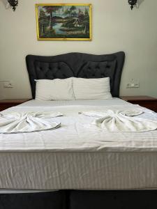 Postel nebo postele na pokoji v ubytování AWWA APART HOTEL