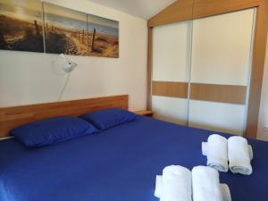 Postel nebo postele na pokoji v ubytování Sweet Apartment With Private Pool Lori Ankaran